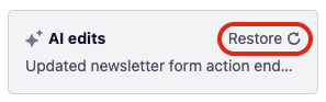 Restore button in the AI Agent chat to undo AI or code changes.